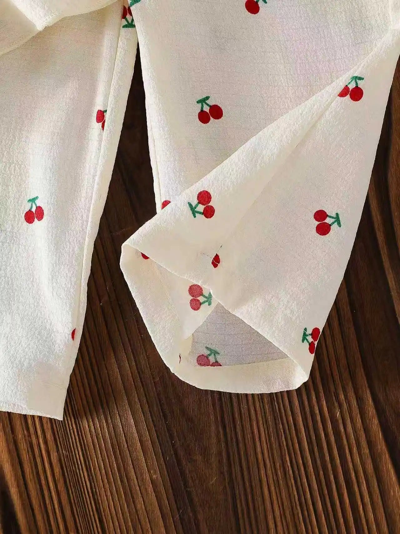 Summer baby girl white cherry print camisole top paired with matching pants in two pieces